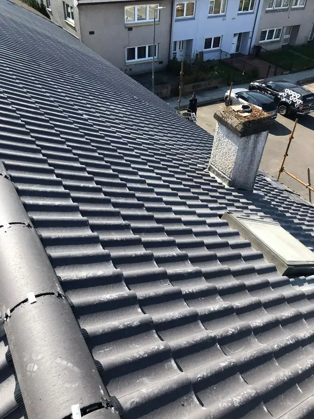 Terrace re-roof by NC Roofing Services — Terraced property · Scaffolded access